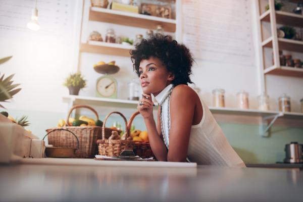 Small business owner thinking about her future